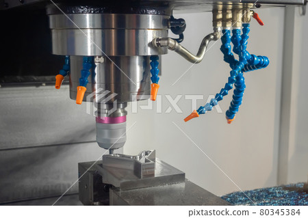 Turning milling machine with cooling system cutting metal workpiece at factory Turning milling machine with cooling system cutting metal workpiece at factory 80345384