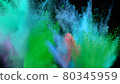 Multi-color powder explosion on black background 80345959