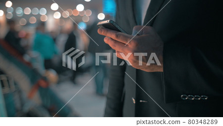 Businessman keeping in touch 80348289