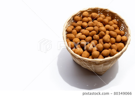 Crispy peanut snack balls on white 80349066