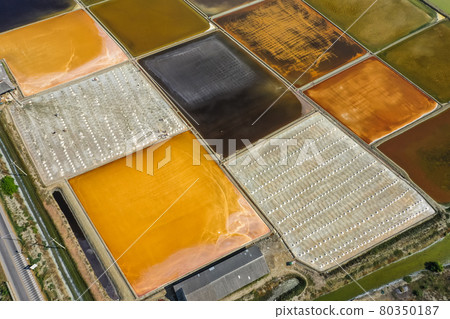 Phetchaburi Salt flats Naklua, farms and farmers collecting salt in Phetchaburi, Thailand 80350187