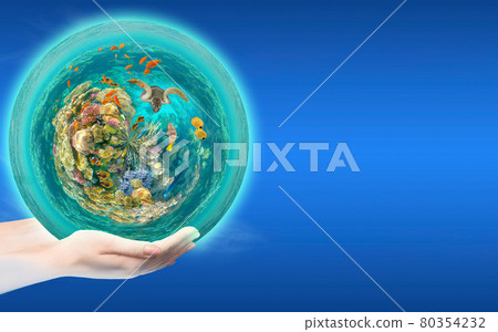 Globe in human hand against blue sky. 80354232