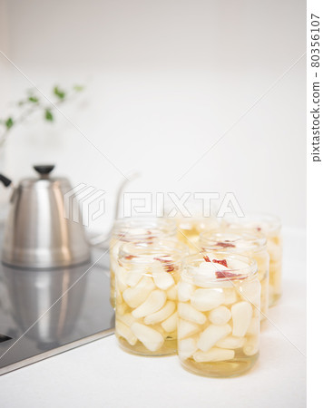 Japanese pickled shallots in jar on mable countertop. Japanese food 80356107