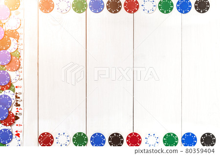 Playing cards and poker chips on white wooden background. Top view Playing cards and poker chips on white wooden background. Top view 80359404