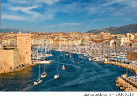 Yachts coming to Marseille Old Port on sunset. Marseille, France Yachts coming to Marseille Old Port on sunset. Marseille, France 80360119