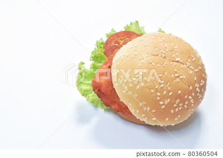 fried chicken hamburger stuffed lettuce and tomato with ketchup on white background fried chicken hamburger stuffed lettuce and tomato with ketchup on white background 80360504