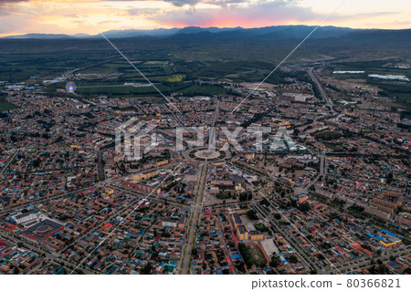 The cityscape of Turks Bagua City in China at dusk. The cityscape of Turks Bagua City in China at dusk. 80366821