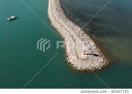 Road and lighthouses on the lake. Shot in Sayram Lake in Xinjiang, China. Road and lighthouses on the lake. Shot in Sayram Lake in Xinjiang, China. 80367185