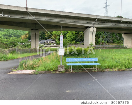 Bus stop and bench in the countryside in the mountains 80367876