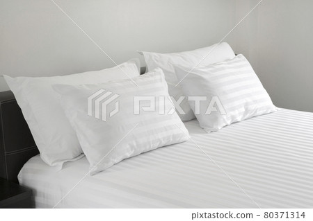 White pillows on a bed Comfortable soft pillows on the bed 80371314