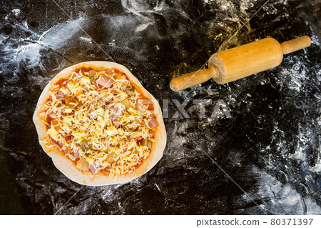 making pizza at kitchen making pizza at kitchen 80371397