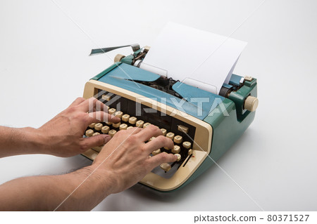 Old typewriter on white background 80371527