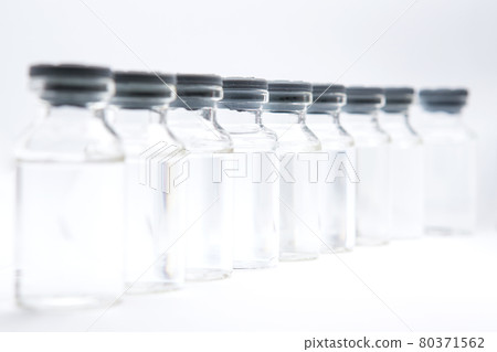 a bottle of vaccine on a white background a bottle of vaccine on a white background 80371562