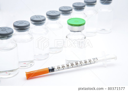 a bottle of vaccine on a white background 80371577