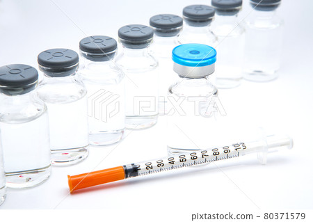 a bottle of vaccine on a white background 80371579