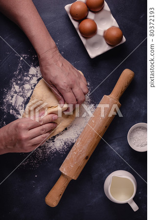 Table with baking products and tools. Table with baking products and tools. 80372193