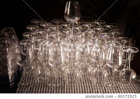 A glass of water prepared at the party. 80372925