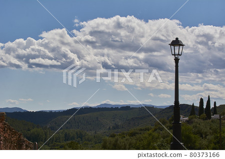 Lonely lamppost in the middle of the field Lonely lamppost in the middle of the field 80373166