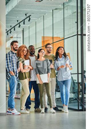 International team of young people posing for collective photo 80375297