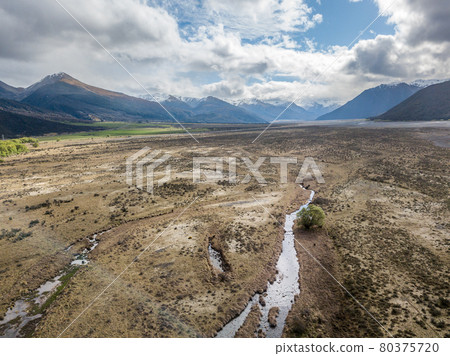 Aerial vista on glacier valley shot in Arthurs Pass National Park, New Zealand Aerial vista on glacier valley shot in Arthurs Pass National Park, New Zealand 80375720