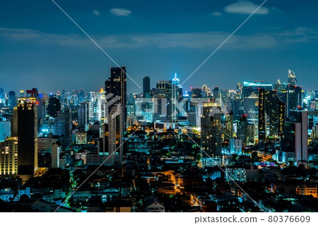 Night cityscape and high-rise buildings in metropolis city center 80376609
