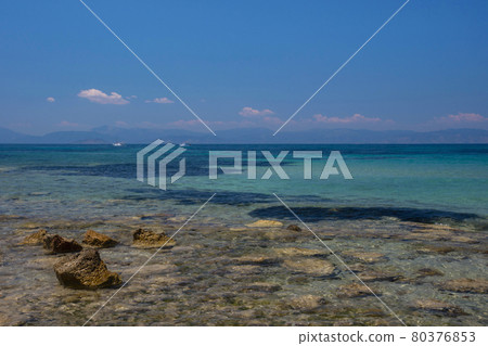 The clear and blue waters of Mediterranean sea in the Saronic gulf, Greece. 80376853
