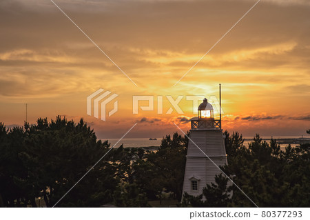Lighthouse and sunset seen from Hiyoriyama Park Lighthouse and sunset seen from Hiyoriyama Park 80377293