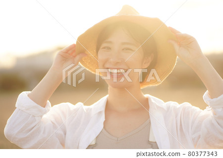 A woman with a smile A woman with a smile 80377343