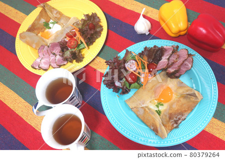 Galette on a colorful plate Galette on a colorful plate 80379264