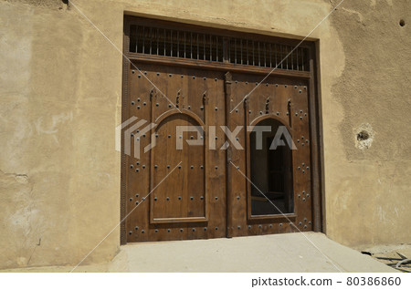Main door of historical Al Zubarah fort, Qatar 80386860