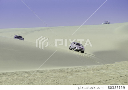 Desert safari on sand dunes of Qatar 80387139