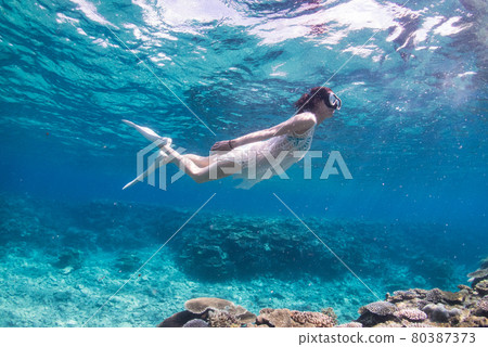 Coral Ver_07 with a woman diving (skin diving) in Ishigaki Island, Okinawa Prefecture 80387373