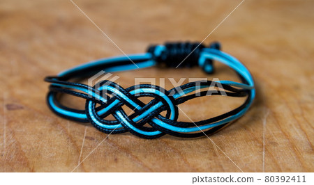 Bead bracelet on the wooden table Bead bracelet on the wooden table 80392411