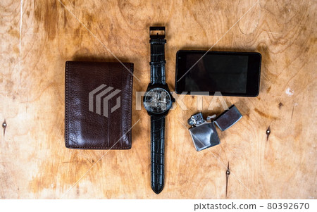 Business wristwatch on the wooden table 80392670