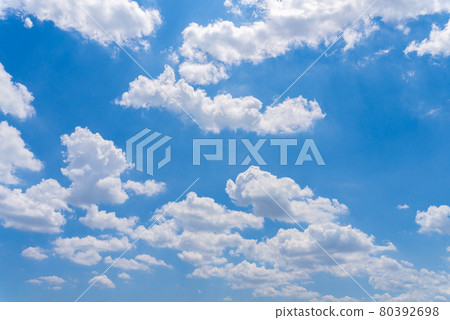 Cumulonimbus clouds in the deep blue summer sky 80392698