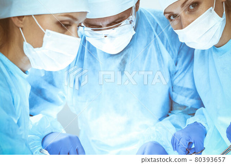 A group of surgeons is operating at the hospital. Health care concept 80393657