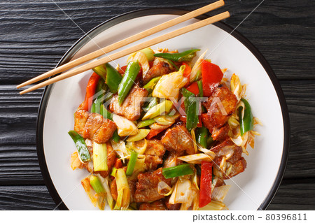 Twice Cooked Pork hui guo rou Szechuan Pork Stir Fry closeup in the plate. Horizontal top view 80396811