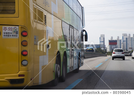 A bus running on the road A bus running on the road 80398045