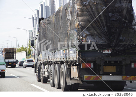 Vehicle carrying industrial waste 80398046