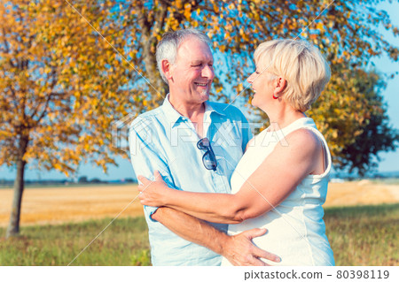 Senior woman and man, couple, embracing each other Senior woman and man, couple, embracing each other 80398119