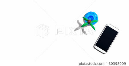 Smartphone with a palm tree float Smartphone with a palm tree float 80398909