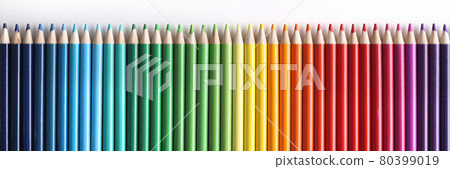 Set of multicolored pencils lying on white background 80399019
