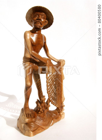 traditional Vietnamese fisherman figurine with seine isolated on a white background 80400580