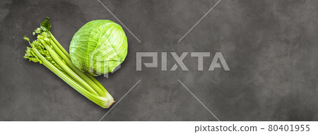 Celery branch bunch and green cabbage isolated on concrete banner Celery branch bunch and green cabbage isolated on concrete banner 80401955