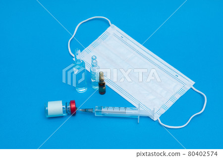 A syringe and ampoules. Vaccination A syringe and ampoules. Vaccination 80402574