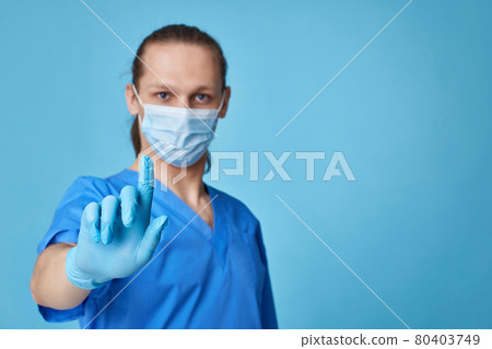man doctor in uniform touching virtual screen 80403749