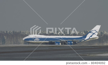 Winter view of freighter Boeing 747 taxiing 80404892