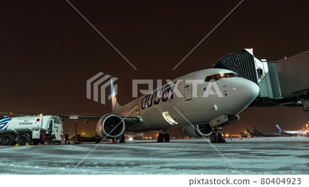 Timelapse of boarding FlyDubai plane and loading luggage at winter night Timelapse of boarding FlyDubai plane and loading luggage at winter night 80404923