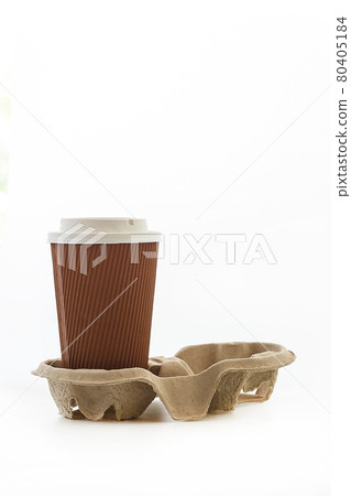 One paper cups with takeaway drinks. Isolated on white background.Pressed cardboard paper double cup holder One paper cups with takeaway drinks. Isolated on white background.Pressed cardboard paper double cup holder 80405184