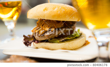 Tasty burger served in cafe Tasty burger served in cafe 80406178